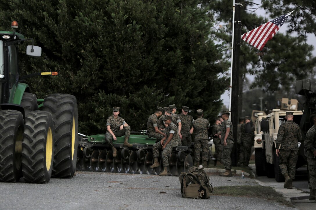 Marines with Combat Logistics Battalion 8 standby for the beginning of the Warsaw Veteran’s Day Parade