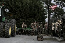 Marines with Combat Logistics Battalion 8 standby for the beginning of the Warsaw Veteran’s Day Parade
