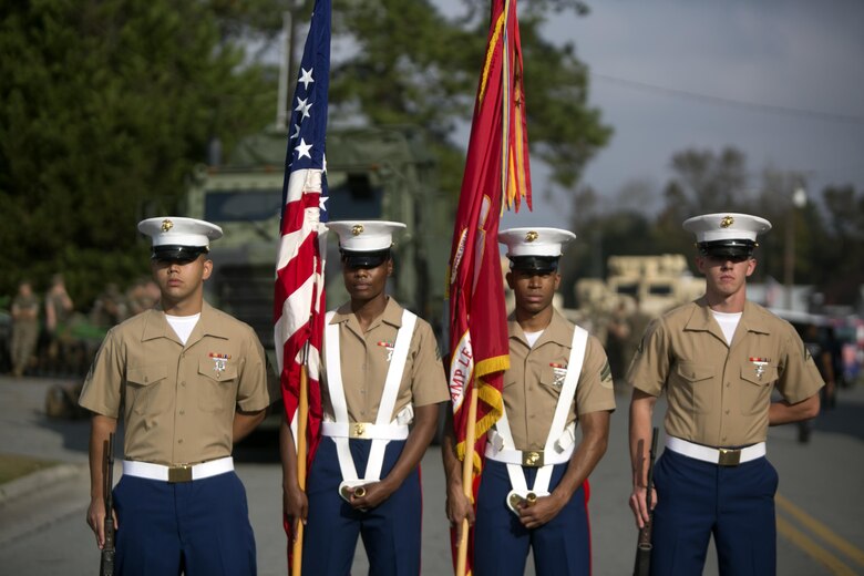 Marines with Headquarters and Support Battalion, Marine Corps Installations - East prepare to march in the Warsaw Veterans Day Parade