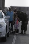 Sgt. James Nero kisses his daughter prior to the Warsaw Veterans Day Parade