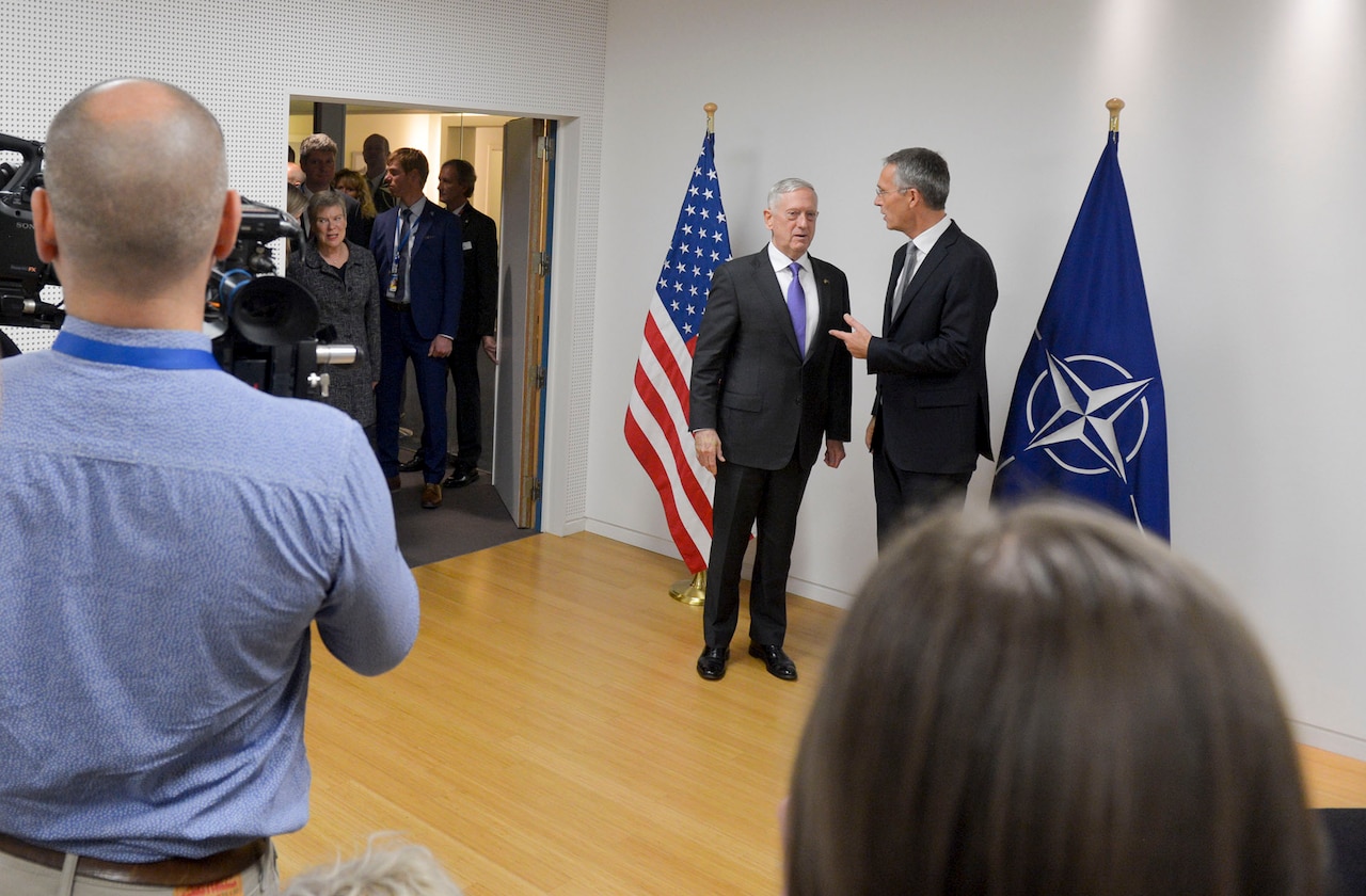 Defense Secretary Jim Mattis and NATO Secretary General Jens Stoltenberg speak before a one-on-one meeting at NATO headquarters in Brussels, Nov. 8, 2017. NATO photo