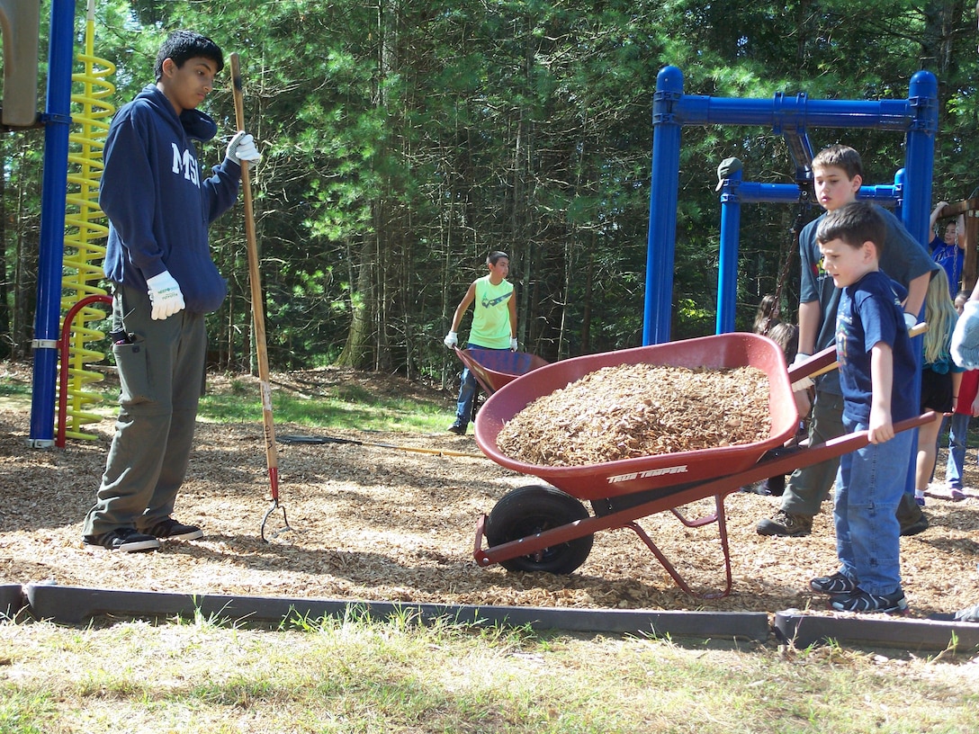 Boys working National Public Land Day at West Hill Dam.