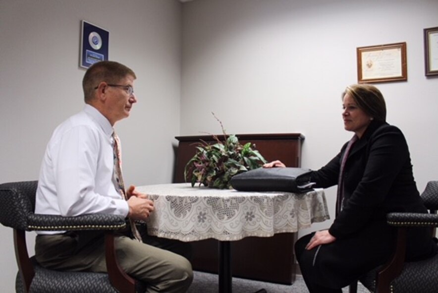 National Background Investigation Bureau Special Agent Josephine Dow meets with Jim Mitchell, 88th Air Base Wing Public Affairs operations chief, to finalize his personnel security investigation. The Air Force currently has more than 90,000 personnel security investigations backlogged. To mitigate, temporary National Background Investigation Bureau satellite hubs will be established on Air Force installations with large numbers of backlogged personnel security investigations.