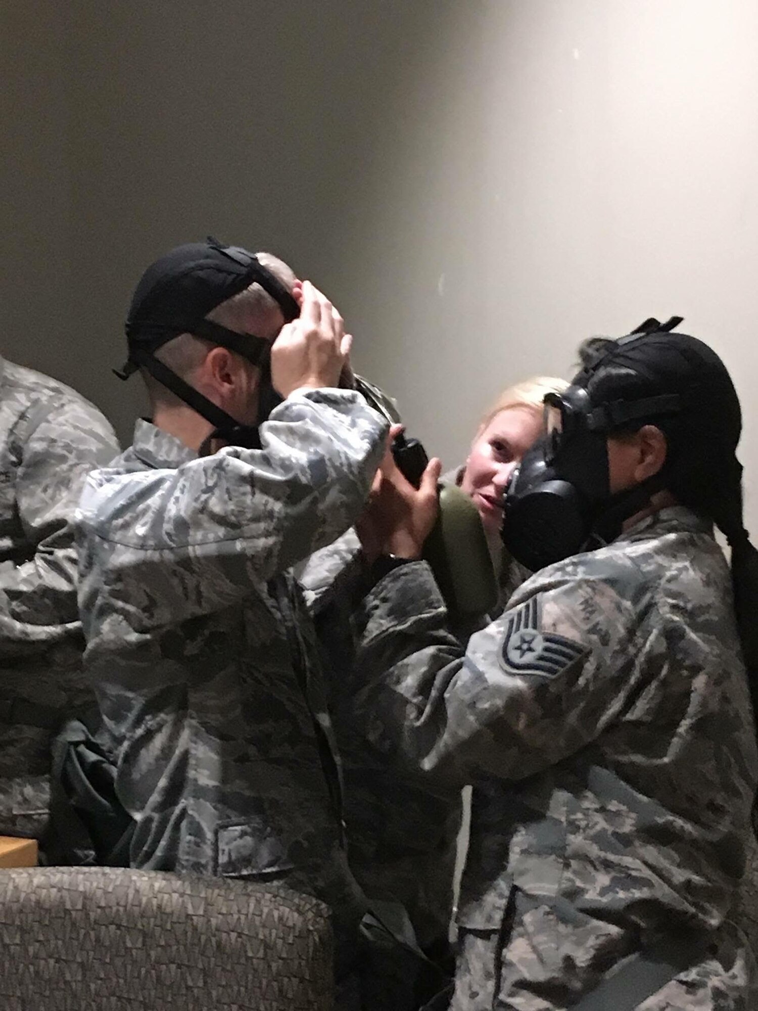 Members of the 507th Air Refueling Wing practice gas mask procedures during CBRN training Aug. 6, 2017 at Tinker Air Force Base, Okla. (U.S. Air Force photo/Tech. Sgt. Samantha Mathison)