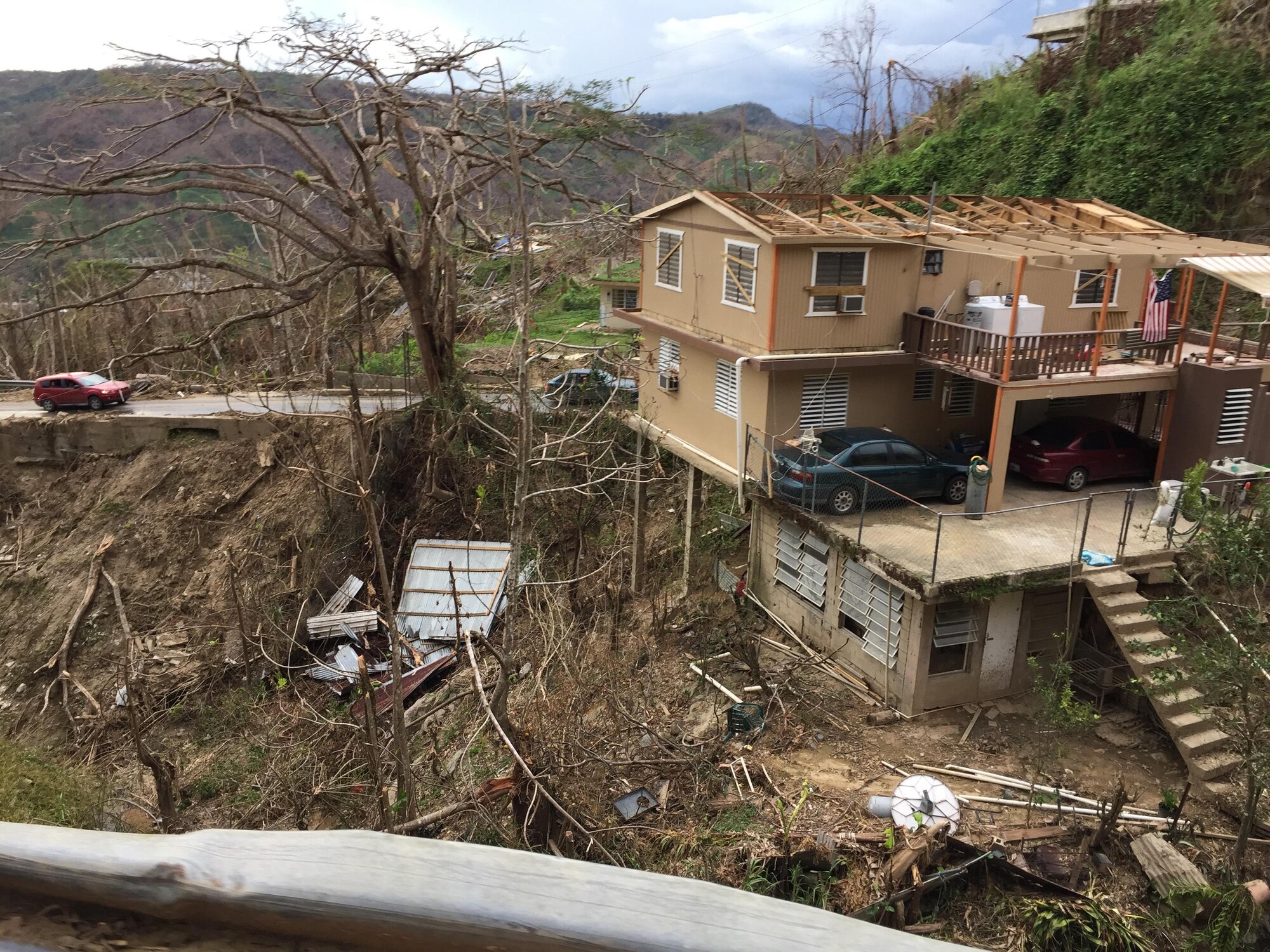 UTUADO, Puerto Rico – Washington Air National Guardsman Master Sgt. Richard Dessert travels the treacherous mountainous roads near Utuado in order to deliver Hurricane Maria relief supplies Oct. 5, 2017.  Dessert volunteered to deploy in support of his civilian employer, World Vision, to provide Hurricane Maria relief and IT support.  (Courtesy photo by Richard Dessert)