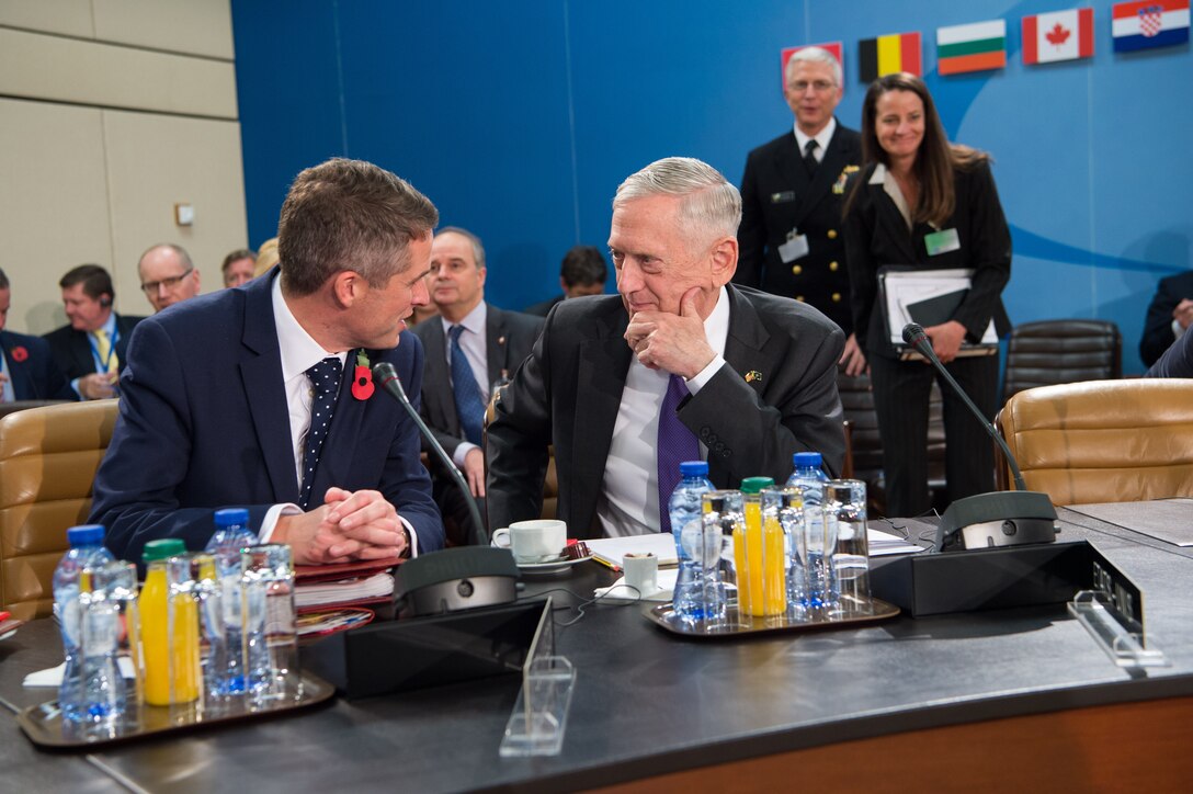 U.S. and British defense leaders talk at NATO meetings in Brussels.