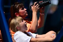 Young girl "gasps" at air show.