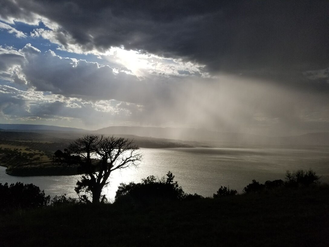 ABIQUIU LAKE, N.M. – A rainstorm moves in over the lake, Aug. 1, 2017.