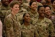 Female Soldiers pose for a photo.