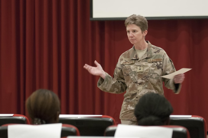 Female Soldier giving a speech.