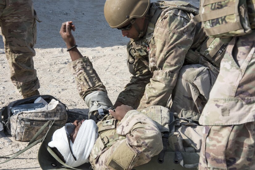 Soldiers practice providing lifesaving care.
