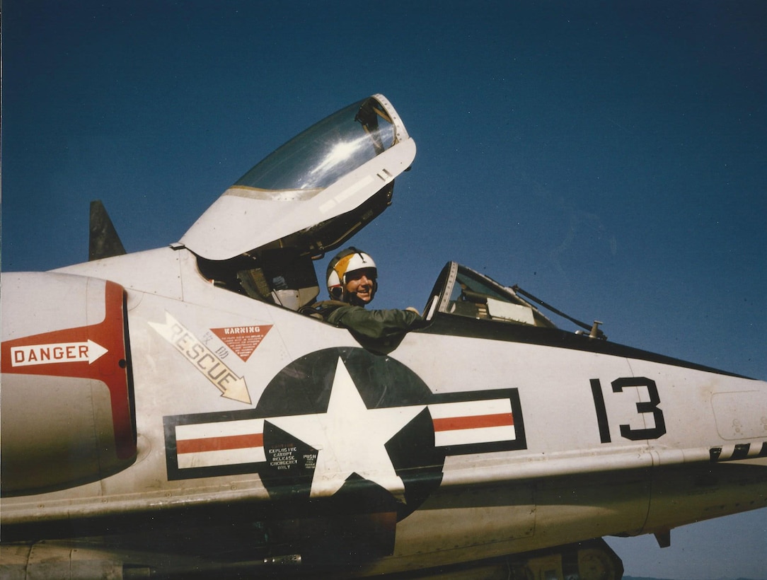 1st Lt Conrad "Ham" Hamilton sits in the cockpit of a Douglas A4 Skyhawk following the 1000th mobile arresting gear landing (MOREST) at Chu Lai Air Base, Vietnam. (Courtesy photo/ Rich Lee)