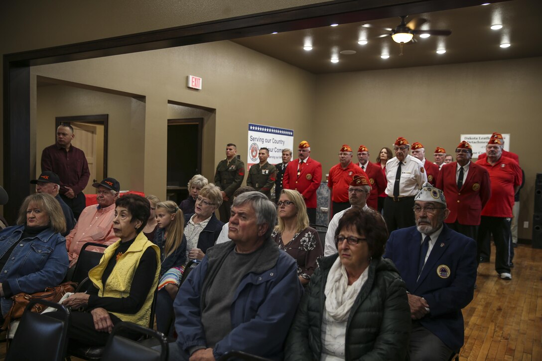 Guests observe during a Silver Star Award ceremony in honor of Lance Cpl. Donald J. Cline on Marine Corps League Detachment 1419, Mandan, North Dakota, Nov 1, 2017.