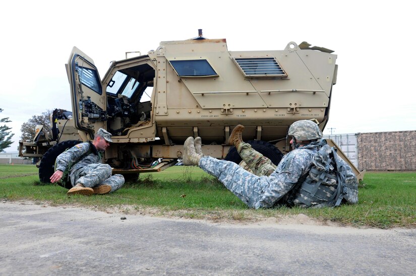 Sergeant 1st Class Nuhi Zhuta, left, from the 304th Civil Affairs Brigade, leads two best warrior competitors through some callisthenic exercises during the medical evaluation portion of the competition at Fort McCoy, Wisconsin, November 1, 2017.
(U.S. Army Reserve photo by Zach Mott, 88th Regional Support Command Public Affairs Office)