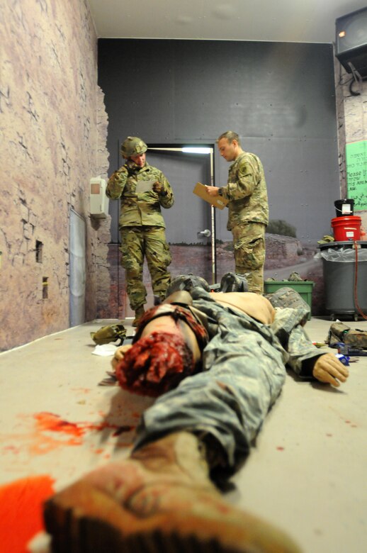 Staff Sgt. Loren Keeler, from 407th Civil Affairs Battalion, completes a nine-line MEDEVAC notification while Sgt. Brian Duckworth, from the 411th Civil Affairs Battalion, assesses Keeler’s performance during the 353rd Civil Affairs Command Best Warrior Competition at Fort McCoy, Wisconsin, November 1, 2017. Keeler went on to win the title of 353rd CACOM 2017 Non-Commissioned Officer of the Year.
(U.S. Army Reserve photo by Zach Mott, 88th Regional Support Command Public Affairs Office)