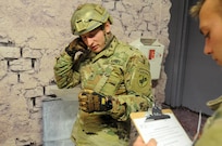 Staff Sgt. Loren Keeler, 407th Civil Affairs Battalion, completes a nine-line MEDEVAC notification during the 353rd Civil Affairs Command Best Warrior Competition at Fort McCoy, Wisconsin, November 1, 2017. Keeler went on to win the title of 353rd CACOM 2017 Non-Commissioned Officer of the Year.
(U.S. Army Reserve photo by Zach Mott, 88th Regional Support Command Public Affairs Office)