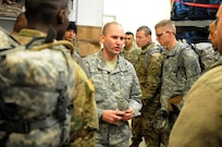 Sergeant 1st Class Nuhi Zhuta, center, from the 304th Civil Affairs Brigade, goes over final instructions for the Best Warrior competitors during a medical evaluation at Fort McCoy, Wisconsin, November 1. Zhuta and other members of the 304th Civil Affairs Brigade evaluated the 10 competitors during the event.
(U.S. Army Reserve photo by Zach Mott, 88th Regional Support Command Public Affairs Office)