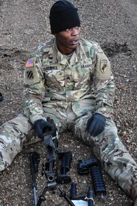 Sergeant Eric Lawrence, 411th Civil Affairs Battalion, disassembles a weapon during the Army Warrior Task lanes at the 353rd Civil Affairs Command Best Warrior Competition at Fort McCoy, Wisconsin, November 3, 2017.
(U.S. Army Reserve photo by Catherine Lowrey, 88th Regional Support Command Public Affairs Office)