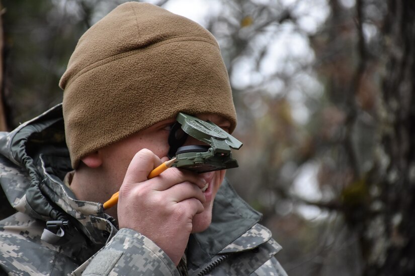 Specialist Christian Patton, 304th Civil Affairs Brigade, finds his next point on the Land Navigation Course during the 353rd Civil Affairs Command Best Warrior Competition at Fort McCoy, Wisconsin, November 3, 2017.
(U.S. Army Reserve photo by Catherine Lowrey, 88th Regional Support Command Public Affairs Office)