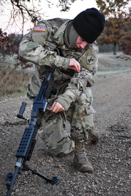 Private Second Class Yanni Tsiranides, 411th Civil Affairs Battalion, performs a functions check on a weapon during the Army Warrior Task lanes at the 353rd Civil Affairs Command Best Warrior Competition at Fort McCoy, Wisconsin, November 3, 2017. Tsiranides went on to win the title of 353rd CACOM 2017 Soldier of the Year. 
(U.S. Army Reserve photo by Catherine Lowrey, 88th Regional Support Command Public Affairs Office)