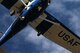 Cadets in a T-51 Deathhawk pass overhead at 200 feet above ground level and release a message container during the October National Intercollegiate Flying Association message drop event. (U.S. Air Force photo by C3C Josiah Bierle)