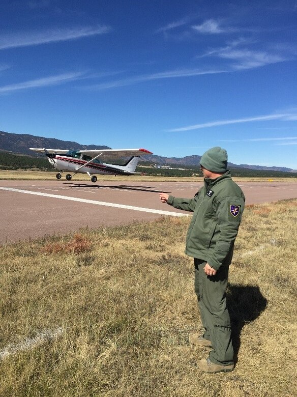 70th FTS Powered Flight Commander Maj. Matt Cummins judges landings during the October National Intercollegiate Flying Association Competition. (U.S. Air Force photo by C2C Carter Thorne)