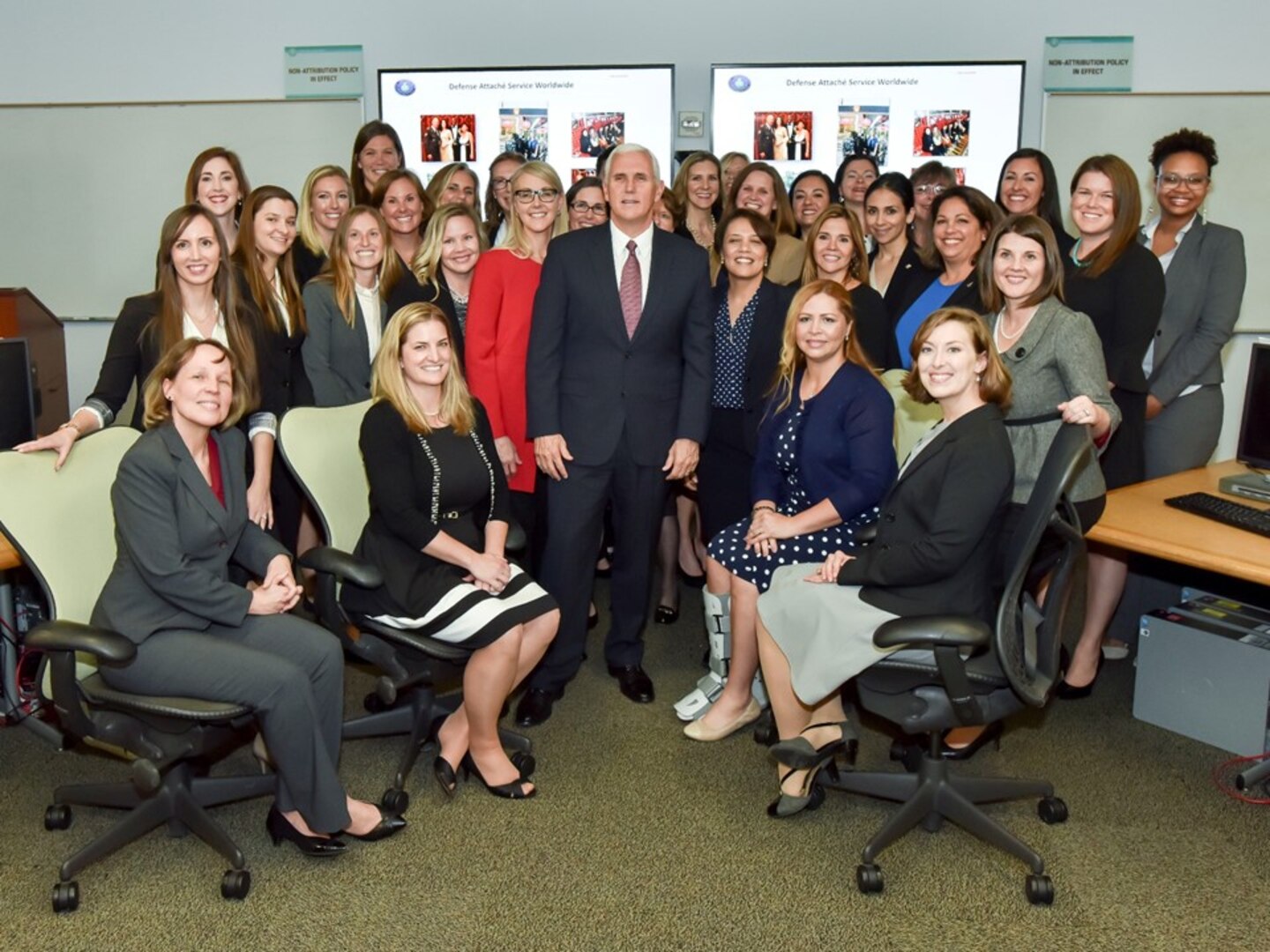 Vice President Mike Pence stands with attaché spouses participating in the Defense Intelligence Agency Defense Attaché program during his visit to DIA headquarters Nov. 6, at Joint Base Anacostia-Bolling in Washington, D.C.