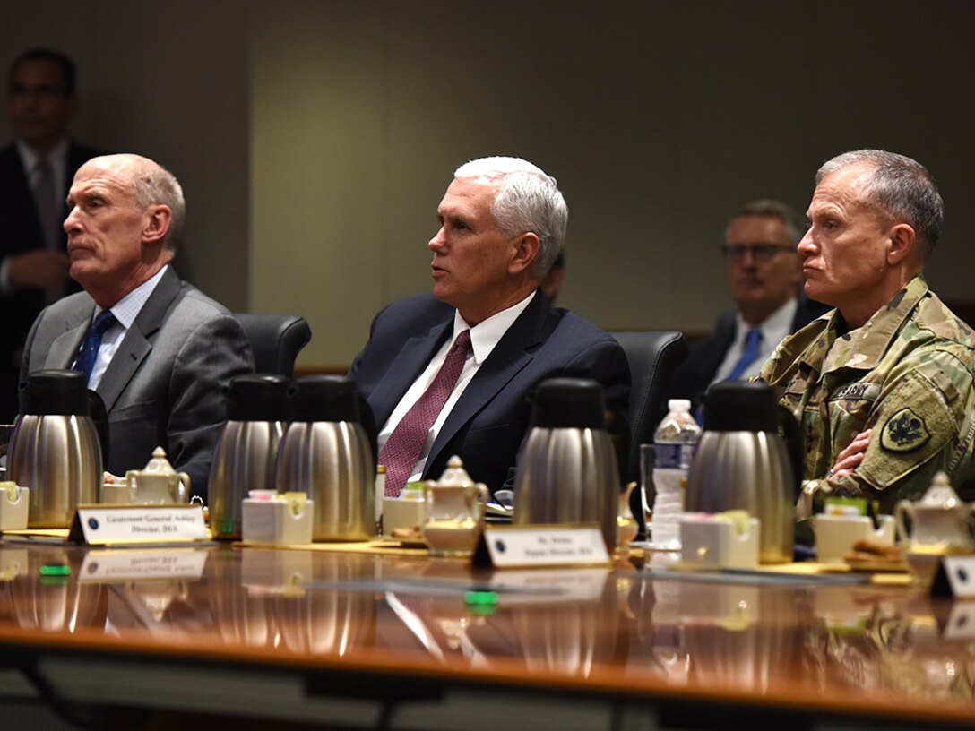 From left, Director of National Intelligence Dan Coats, Vice President Mike Pence and Defense Intelligence Agency Director Lt. Gen. Robert Ashley listen to an intelligence brief during the vice president’s visit to DIA headquarters Nov. 6, at Joint Base Anacostia-Bolling in Washington, D.C.