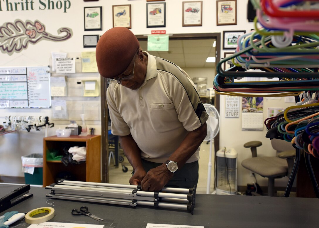 Retired U.S. Air Force Master Sgt. Clarence Rollins, ‘Rocky’, works in the consignments section at the Thrift Shop, Oct. 5, 2017, Vandenberg Air Force Base, Calif. Rocky’s position at the Thrift Shop has become more than another job for him – it’s become his extended family. (U.S. Air Force photo by Senior Airman Kyla Gifford/Released)