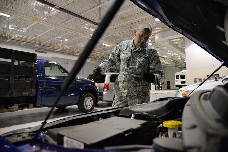 Airman 1st Class Mark Martinez, 341st Logistics Readiness Squadron vehicle operator, checks a vehicle’s oil Nov. 7, 2017, at Malmstrom Air Force Base, Mont.