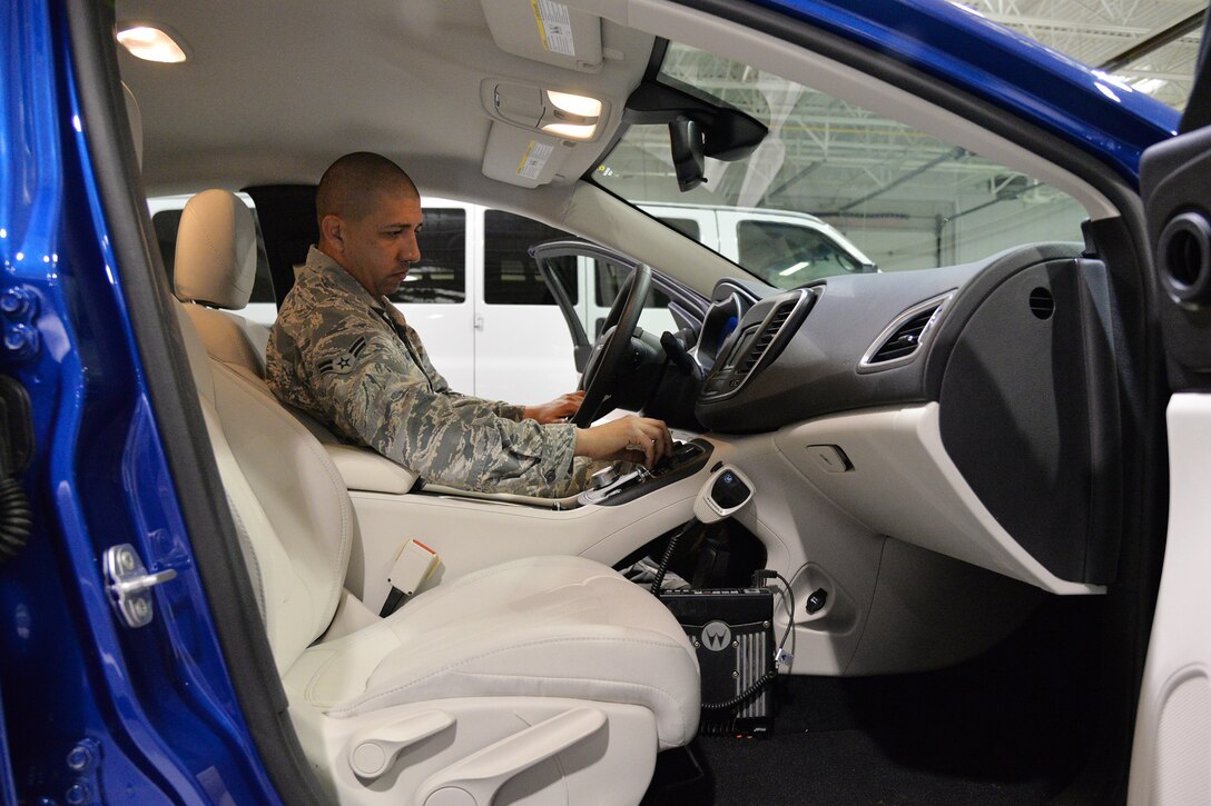 Airman 1st Class Mark Martinez, 341st Logistics Readiness Squadron vehicle operator, checks the condition of a vehicle Nov. 7, 2017, at Malmstrom Air Force Base, Mont.