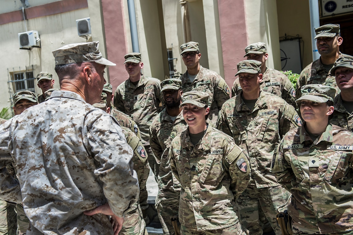 Marine Corps Gen. Joe Dunford, chairman of the Joint Chiefs of Staff, speaks with soldiers in Afghanistan.