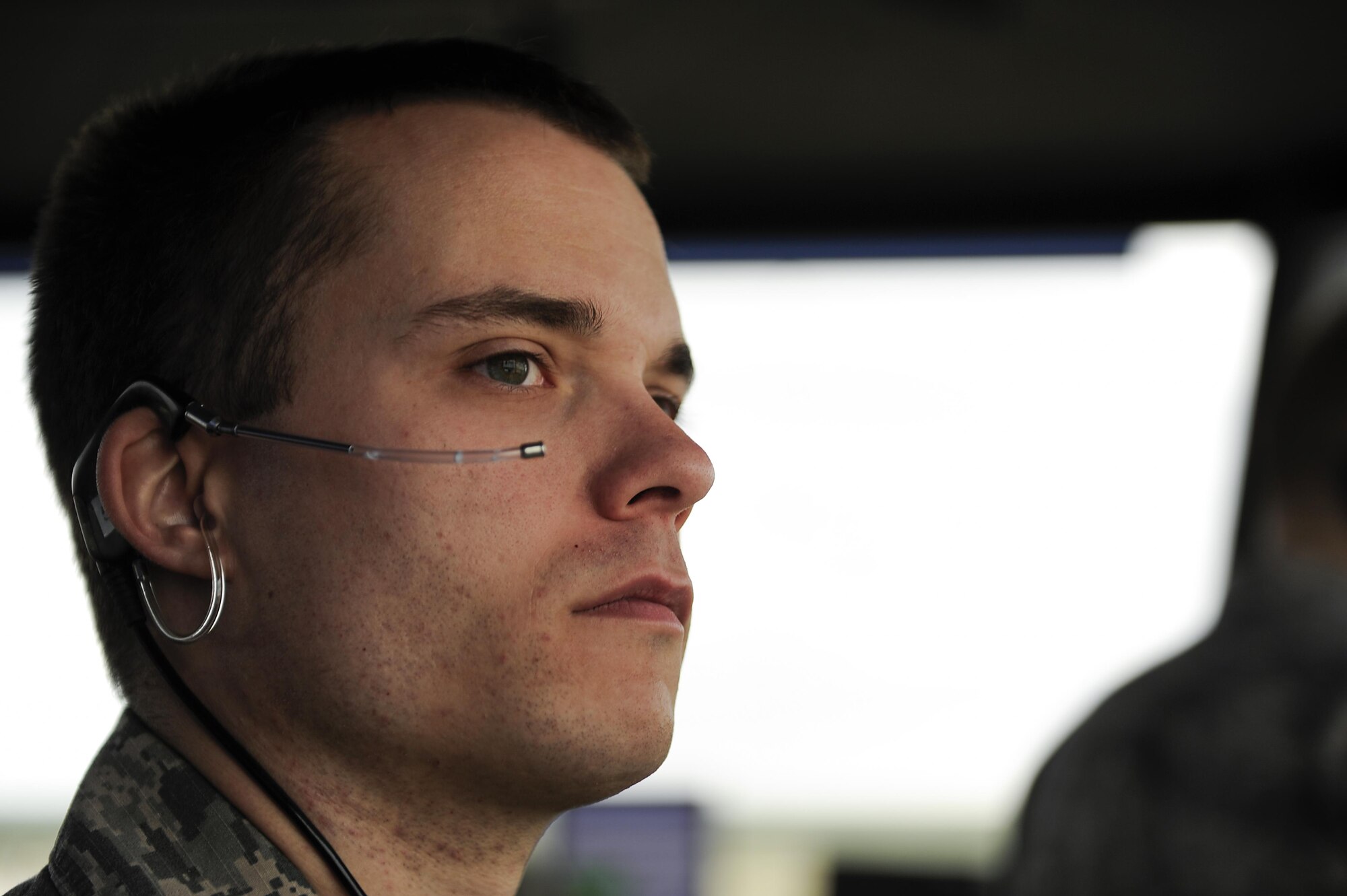 Staff Sgt. Dylan Edney, 47th Operations Support Squadron air traffic control watch supervisor, monitors flightline activity during a morning shift at Laughlin Air Force Base, Texas, Oct. 24, 2017. Laughlin’s air traffic control tower is manned by five positions--the watch supervisor, the supervisor of flying, flight data, ground control and local control. (U.S. Air Force/Airman 1st Class Benjamin N. Valmoja)