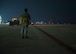 An Airman with the Wisconsin Air National Guard’s 115th Fighter Wing watches as the last of the unit’s F-16 Fighting Falcons taxi toward the end of the runway at Kunsan Air Base, Republic of Korea, Nov. 4, 2017. The aircraft and Airmen assigned to the 115th spent approximately three months on the Korean Peninsula in support of U.S. Pacific Command’s priority to secure and maintain peace in the Indo-Asia-Pacific region. (U.S. Air Force photo by Capt. Christopher Mesnard)