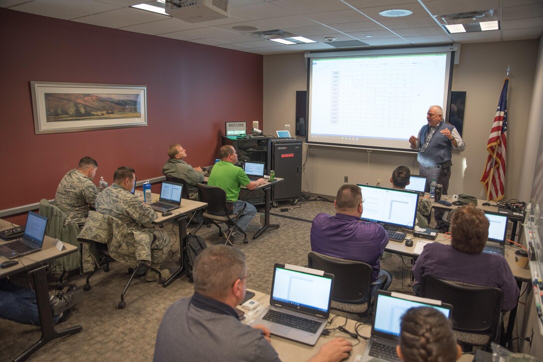 Mr. Randy Pierce, an instructor with the mobile training team from Keesler AFB, Miss., conducts an exercise in trend analysis while teaching the Air Force Reserve Command's quality assurance course at Minneapolis-St. Paul Air Reserve Station, Minn., Nov. 9, 2017.