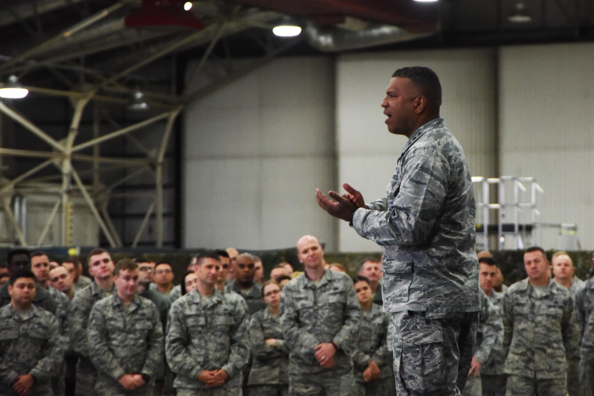 Lt. Gen. Richard M. Clark, 3rd Air Force Commander, speaks to a crowd of Airmen during his presentation at Royal Air Force Lakenheath, England, Nov. 7. The general handed out various awards to outstanding Airmen for their contributions towards the mission. (U.S. Air Force photo/Airman 1st Class Christopher S. Sparks)