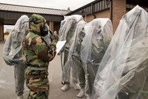 U.S. Air Force Reserve Staff Sgt. Casey Godwin, aircrew flight equipment (AFE) technician, 913th Operations Support Squadron, briefs aircrew members before they enter the Aircrew Contamination Control Area (ACCA) Nov. 4, 2017, at Little Rock Air Force Base, Ark.