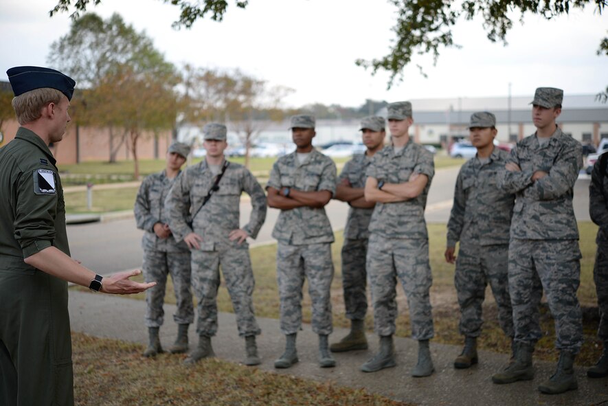 Capt. Christian Litscher, 14th Operations Group Commander’s Action Group officer, speaks to cadets about what pilot training is like on Columbus Air Force Base, Mississippi, Nov. 3, 2017. The students were split into groups; some of them got a close-up look at Columbus AFB’s three aircraft while others received tours of the flying training squadrons as they spoke with experienced Air Force pilots. (U.S. Air Force photo by Airman 1st Class Keith Holcomb)