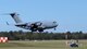 Two 14th Operations Support Squadron Radar, Airfield and Weather Systems Flight (RAWS) technicians watch a C-17 Globemaster III from Joint Base Charleston, South Carolina, prepare to land Nov. 2, 2017, on Columbus Air Force Base, Mississippi. The RAWS Flight technicians work to maintain the radar and communication equipment that allows aircraft to land safely and efficiently on Columbus AFB. (U.S Air Force photo by Airman 1st Class Keith Holcomb)