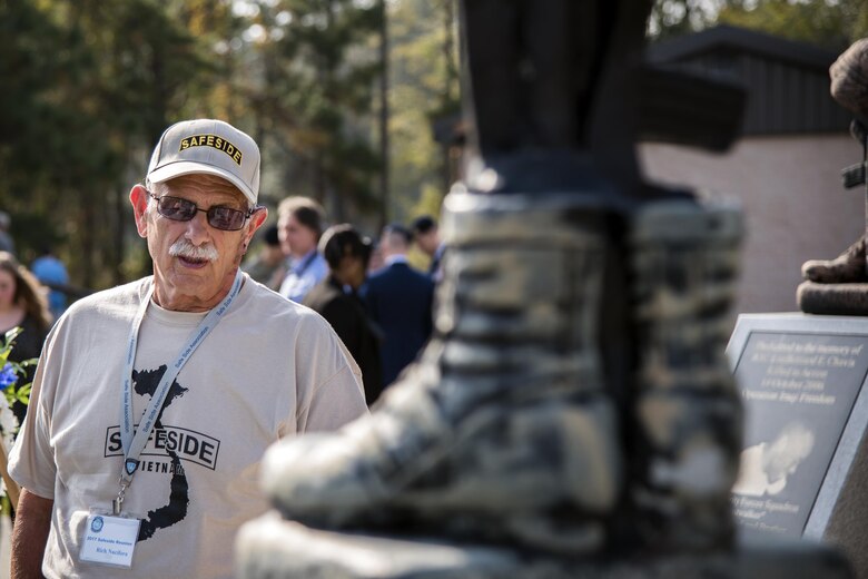 Rich Nucifora, member of the Safeside Association looks at a memorial during a Safeside reunion, Nov.8, 2017, at Moody Air Force Base, Ga. Biennially, the Safeside Association holds a reunion to interact with and honor their past and present comrades from the 820th Base Defense Group. (U.S. Air Force photo by Airman Eugene Oliver)