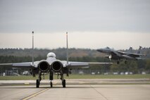 An F-15C Eagle from the 493rd Fighter Squadron, lands on the flight line at Royal Air Force Lakenheath, England, Nov. 6. This year, 493rd FS earned the coveted Raytheon Trophy for the fifth time in 10 years for performance across specified mission sets, exercise participation, inspection results and squadron and individual achievements. (U.S. Air Force photo/Staff Sgt. Emerson Nuñez)