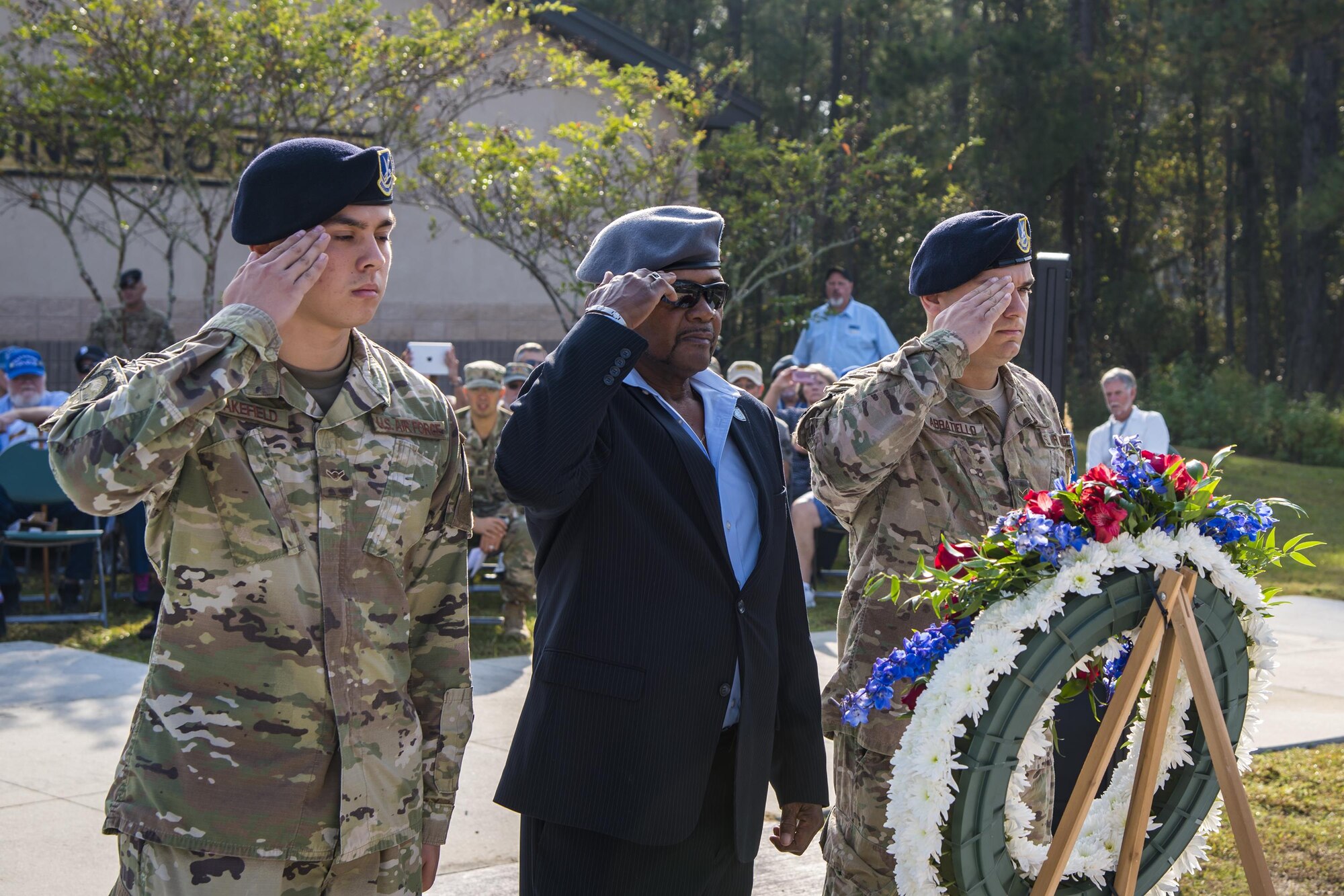 Members of the Safeside Association and 820th Base Defense Group, render a salute during a Safeside reunion memorial, Nov.8, 2017, at Moody Air Force Base, Ga. Biennially, the Safeside Association holds a reunion to interact with and honor their past and present comrades from the 820th Base Defense Group. (U.S. Air Force photo by Airman Eugene Oliver)