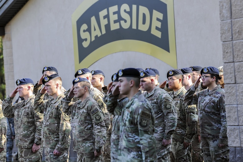 Members of the 823d Base Defense Squadron render a salute during a Safeside reunion memorial, Nov.8, 2017, at Moody Air Force Base, Ga. Biennially the Safeside Association holds a reunion to interact with and honor their past and present comrades from the 820th Base Defense Group. (U.S. Air Force photo by Airman Eugene Oliver)
