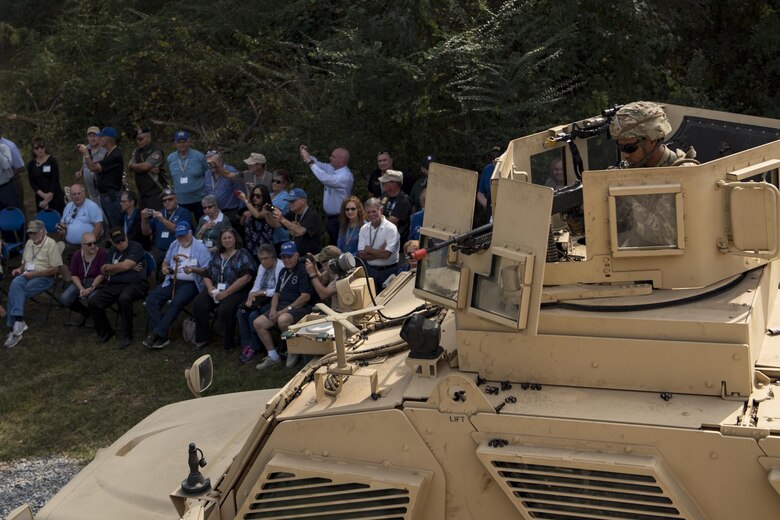 Members of the Safeside Association watch a demonstration by the 820th Base Defense Group, Nov. 8, 2017, at Moody Air Force Base, Ga. Safeside reunions are biennial and scheduled around the 820th Base Defense Group’s high-ops tempo. (U.S. Air Force photo by Senior Airman Daniel Snider)