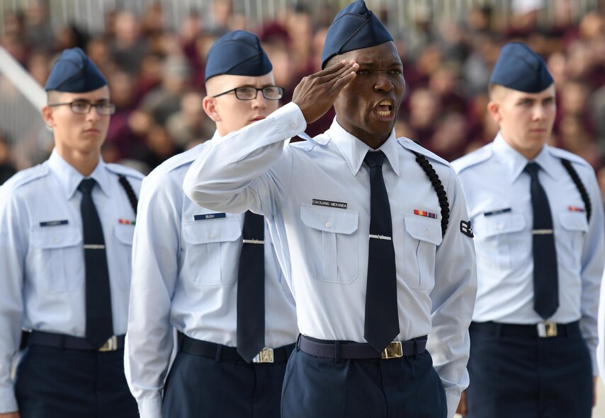 Airman 1st Class Michael Enkouang-Mekanda, 336th Training Squadron regulation drill team drillmaster, requests permission to enter the field of regulation drill competition during the 81st Training Group drill down at Keesler Air Force Base, Miss. Nov. 3, 2017. Airmen from the 81st TRG competed in the final quarterly open ranks inspection, regulation drill routine and freestyle drill routine. (U.S. Air Force photo by Kemberly Groue)