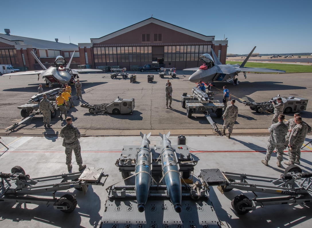 U.S. Air Force weapons load crew