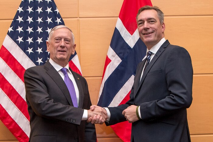 Defense Secretary Jim Mattis shakes hands with Norwegian Defense Minister Frank Bakke-Jensen at NATO Headquarters