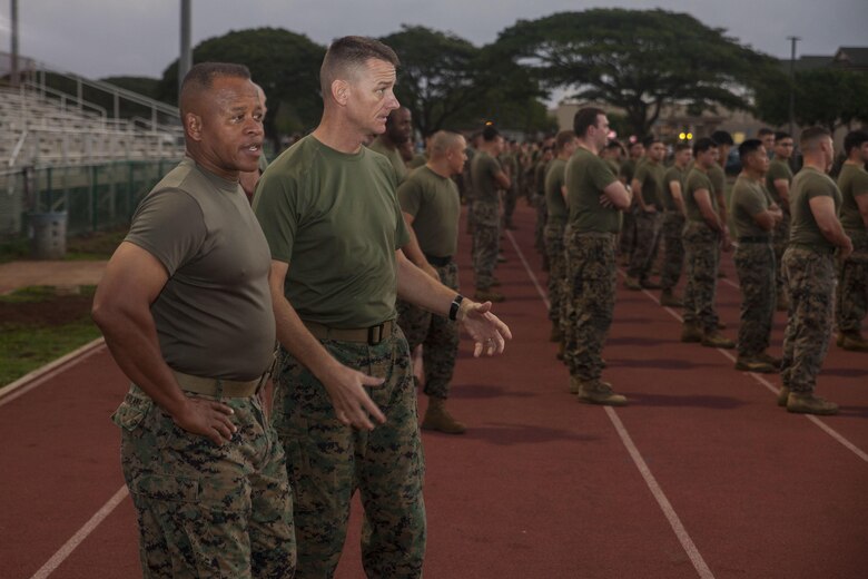 Maj. Gen. Craig Timberlake, the commanding general of 3rd Marine Division, interacts with Col. Michael Styskal, the commanding officer of 3rd Marine Regiment, prior to a motivational unit run to commemorate Bougainville Day, Marine Corps Base Hawaii, Nov. 1, 2017. Bougainville Day is the 75th Anniversary of the unit and 74th anniversary of the Battle of Bougainville. The battle happened on Nov. 1, 1943, when 3rd Marines landed at Empress Augusta Bay, Bougainville, to establish a beachhead, fending off thousands of Imperial Japanese soldiers. (U.S. Marine Corps photo by Cpl. Jesus Sepulveda Torres)