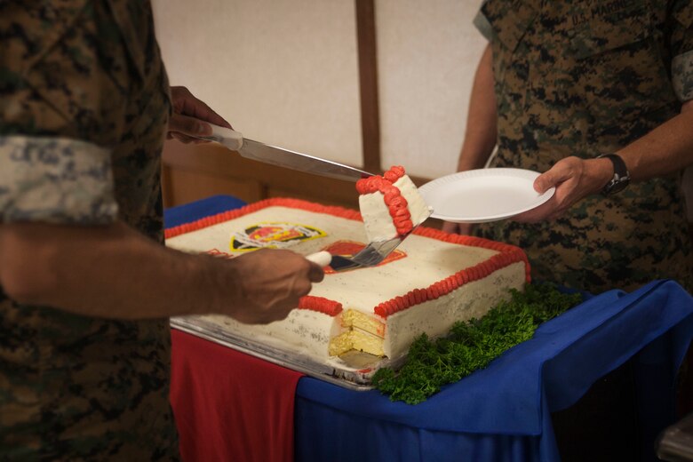 Sgt. Maj. Alfonso Via, the 3rd Marine Regiment sergeant major, cuts a piece of cake for Col. Michael Styskal, the regiment’s commanding officer to celebrate Bougainville Day, Marine Corps Base Hawaii, Nov. 1, 2017. Bougainville Day is the 75th Anniversary of the unit and 74th anniversary of the Battle of Bougainville. The battle happened on Nov. 1, 1943, when 3rd Marines landed at Empress Augusta Bay, Bougainville, to establish a beachhead, fending off thousands of Imperial Japanese soldiers. (U.S. Marine Corps photo by Cpl. Jesus Sepulveda Torres)