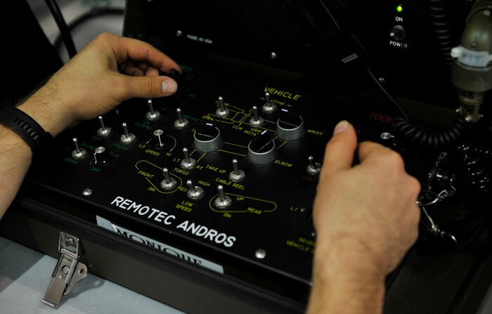 Senior Airman Matthew Koser, 315th Civil Engineer Squadron Explosive Ordnance Disposal craftsman, remotely operates a REMOTEC Andros F6A robot at the Joint Base Charleston Naval Weapons Station EOD range, S.C., Nov. 2, 2017.